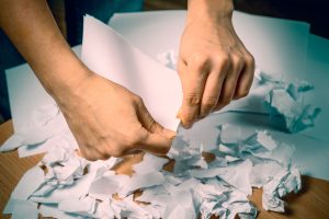 tearing up paper